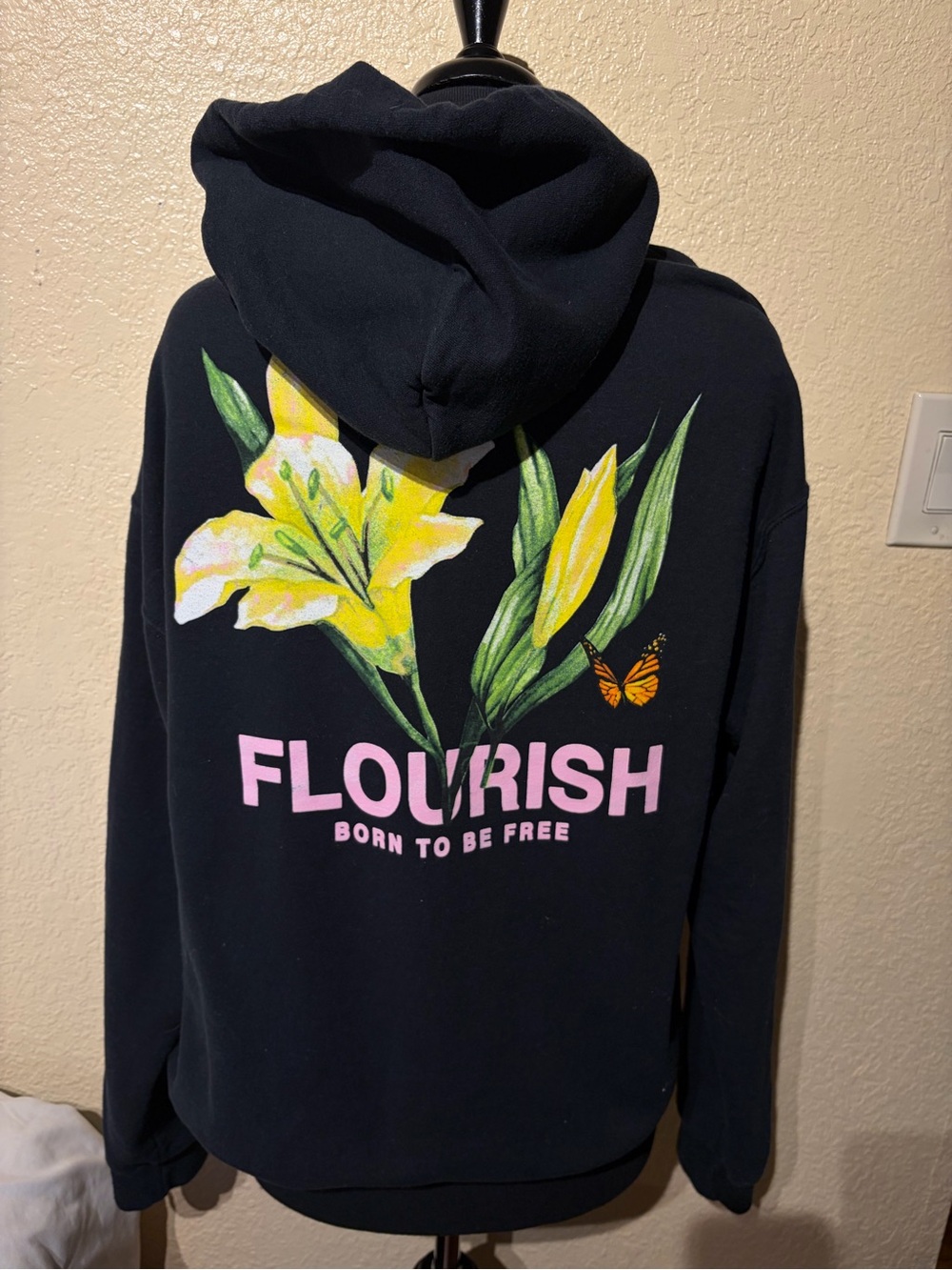 Flourish "Born to Be Free" women’s Black Hoodie with Yellow Floral Print